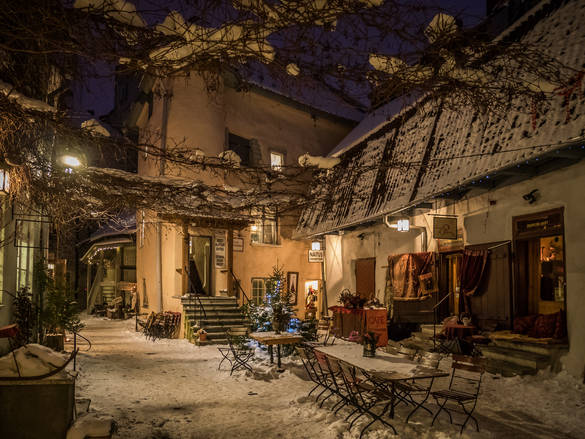 Masters' Courtyard in Tallinn, Estonia Lovely external view of the cafes at the Masters' Courtyard in Tallinn, Estonia in winter.