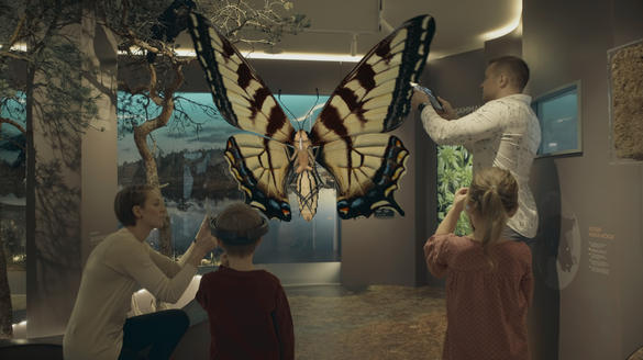 Family is watching huge big Butterfly_Estonian Museum of Natural History_2020.jpg_in Tallinn, Estonia Family is watching huge big Butterfly in Estonian Museum of Natural History, in Tallinn, Estonia.